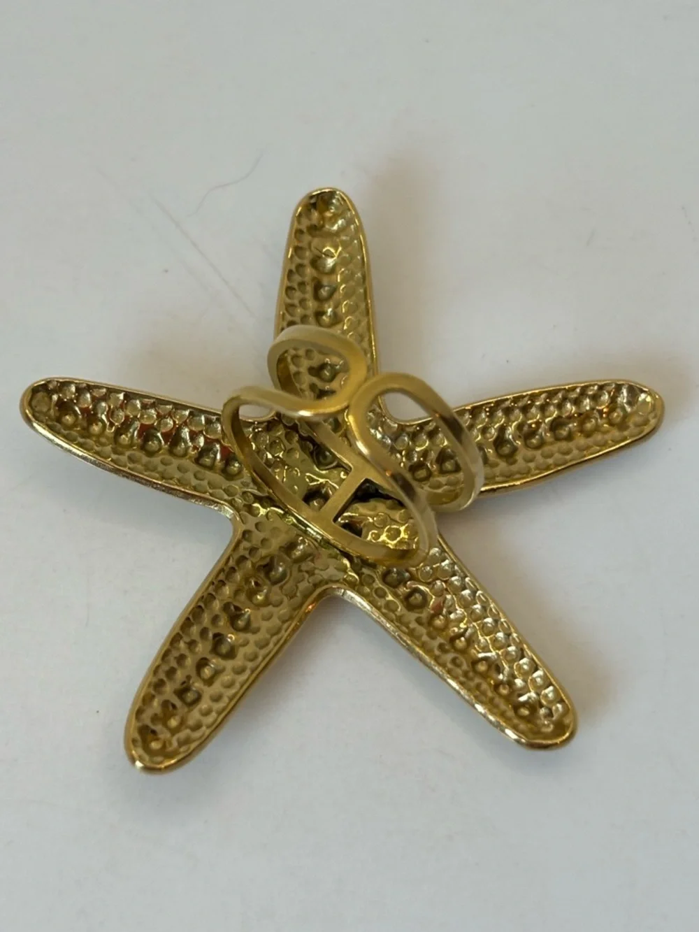 Ion plated gold starfish open back ring